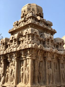 Dharmaraja Ratha is a monument in the Pancha Rathas is an example of monolith Indian rock-cut architecture. Resembling a chariot ratha, it is carved out of a single, long stone of pink granite. This is one of the Group of Monuments at Mahabalipuram and also a UNESCO World Heritage Site. The unfinished structure is dedicated to the Lord Shiva.