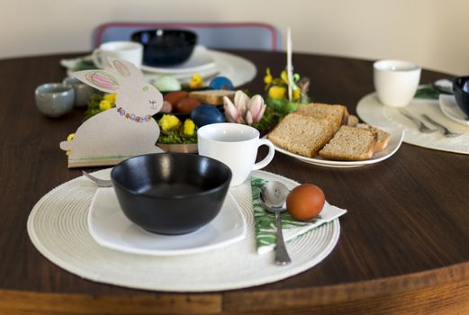 table setting ready for easter breakfast in regular home