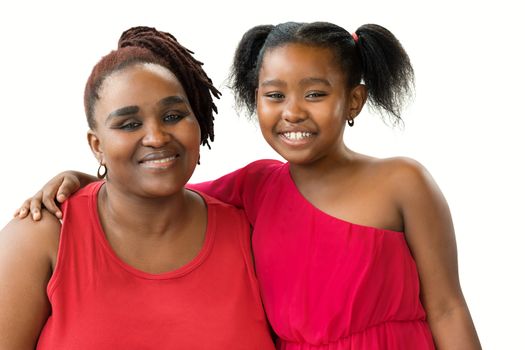 Close up portrait of smiling african mother and little daughter. Women dressed in red looking at camera. Isolated on white background.