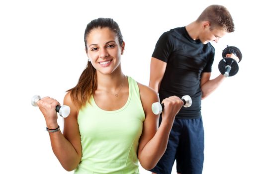 Close up portrait of attractive teen girl doing aerobic workout with boy in background. Isolated on white background.