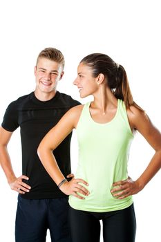 Close up portrait of attractive teen couple in sportswear ready for fitness workout.Isolated on white background.