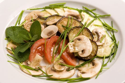 Vegetable salad with raw champignons. Healthy vegetarian food.