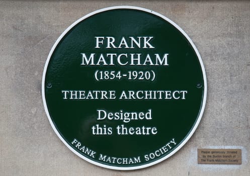 Plaque comemorating theatre architect Frank Matcham on Buxton Opera House