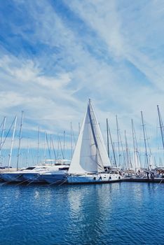 Yachts and boats in the harbor on Mediterranean sea coast, travel and leisure scene
