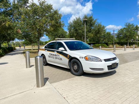 Orlando, FL/USA-5/6/20: A University of Central Florida Community Service Officer patrol car parked on the UCF School of Medicine Campus in Orlando, Florida.
