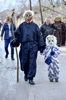 VEVCANI, MACEDONIA - 13 JANUARY , 2020: General atmosphere with dressed up participants at an annual Vevcani Carnival, in southwestern Macedonia