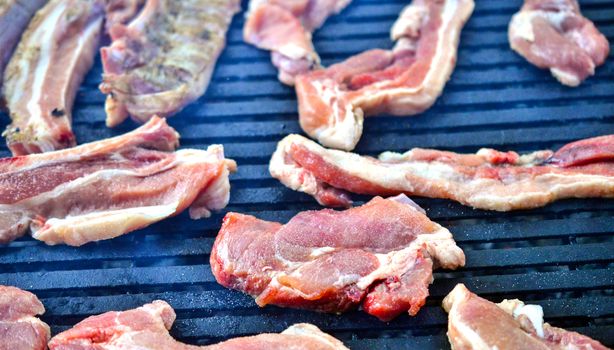 grilling meat meat on a coal barbeque image