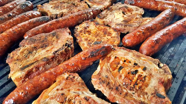 grilling meat meat on a coal barbeque image