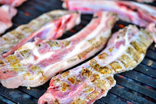 grilling meat meat on a coal barbeque image