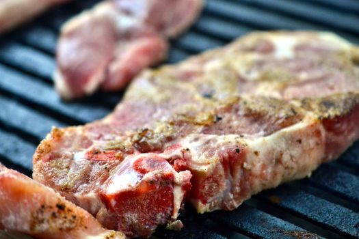 grilling meat meat on a coal barbeque image