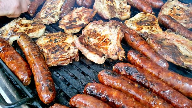 grilling meat meat on a coal barbeque image