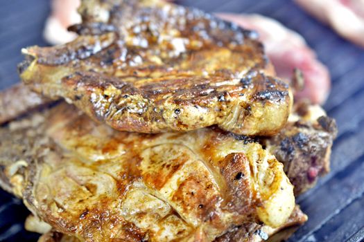 grilling meat meat on a coal barbeque image