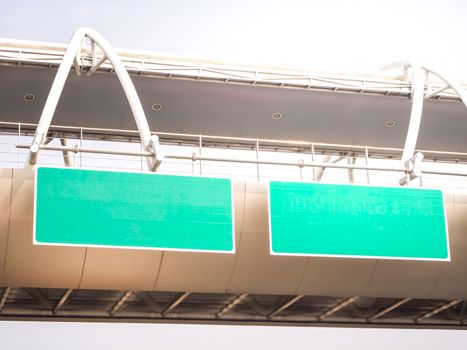 Green background labe on the bridge and blue sky background