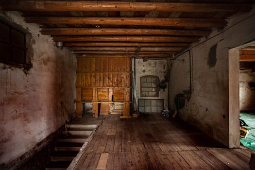 Detail of a room on an old and abandoned house in Italy