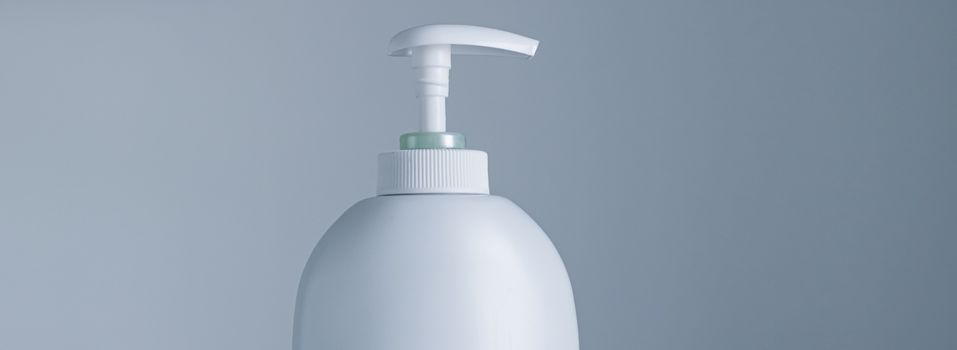 Blank label cosmetic container bottle as product mockup on gray background, hygiene and healthcare