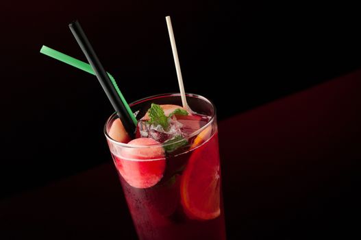 ice tea in a glass on a dark background