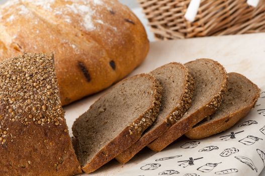 bread in a wicker basket on a light background on a table