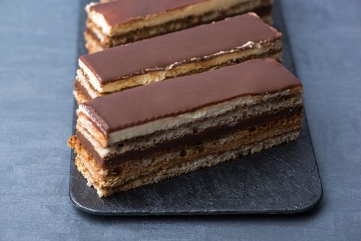 appetizing cake on a black plate