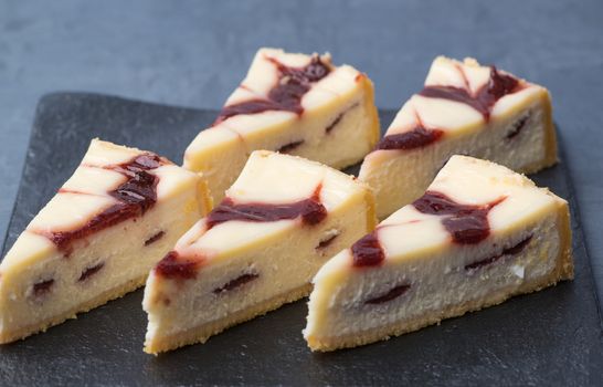 appetizing cake on a black plate