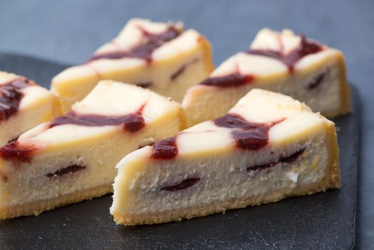 appetizing cake on a black plate