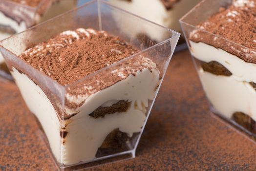 ice cream in a square plastic cup, close-up