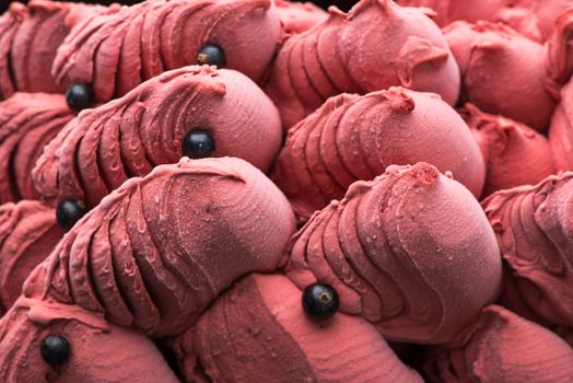 close-up of appetizing ice cream with berries, macro photography