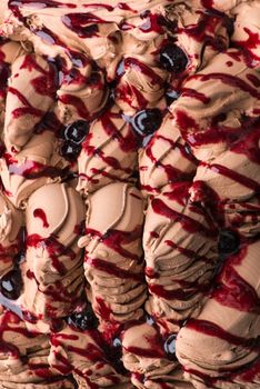 close-up of appetizing ice cream with berries, macro photography