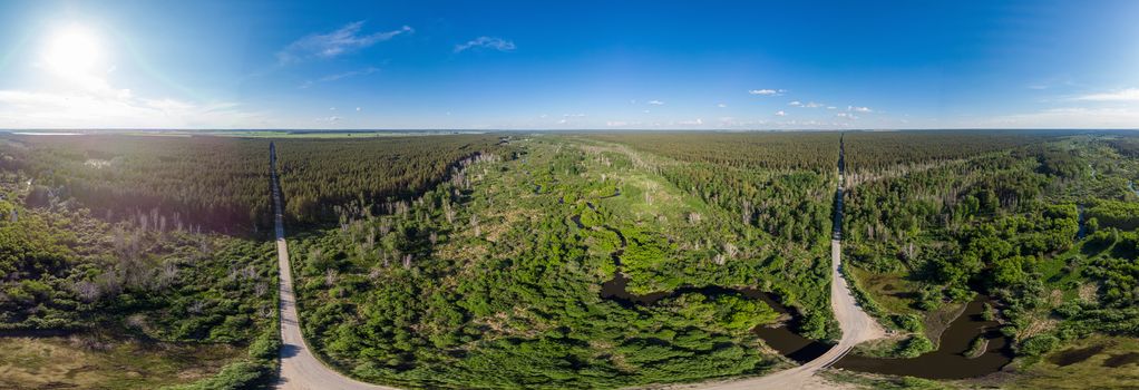 Full 360 equirectangular spherical panorama of aerial top vew with a beautiful landscape with a lake two roads, forest and river . Virtual reality content