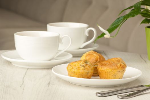 cake and cup of coffee with flowers on the table