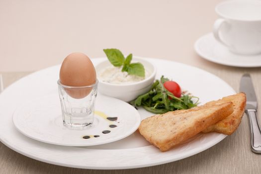 breakfast served with fried bread and egg and curd