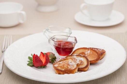 breakfast served with toast with strawberries and milk