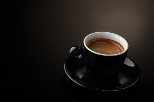 black coffee cup with saucer