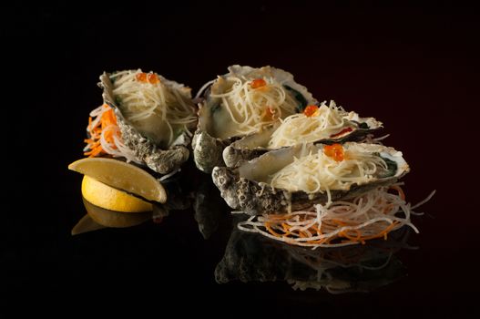 seafood and mussels in a shell with melted cheese and lemon slices on a black background with reflection. mussels in a shell with salad on a dark background