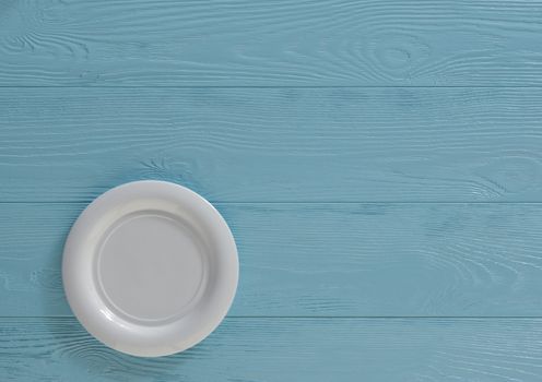 wooden food background with empty plate