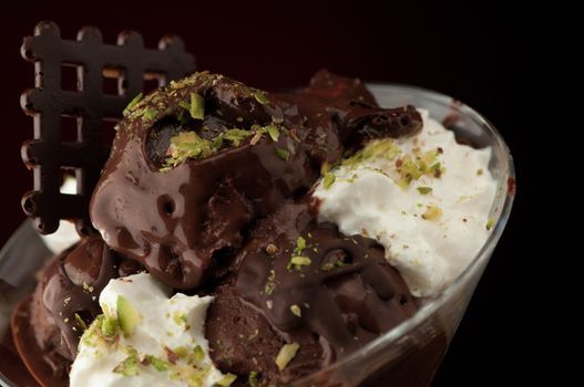 Ice cream in a vase on a dark background