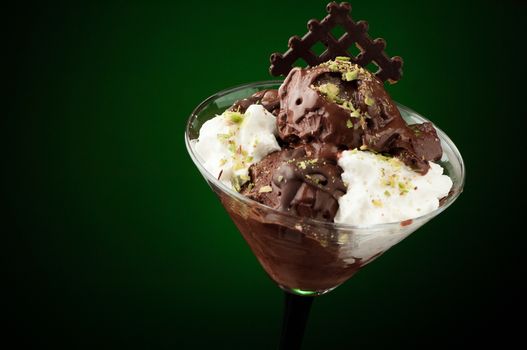 Ice cream in a vase on a dark background