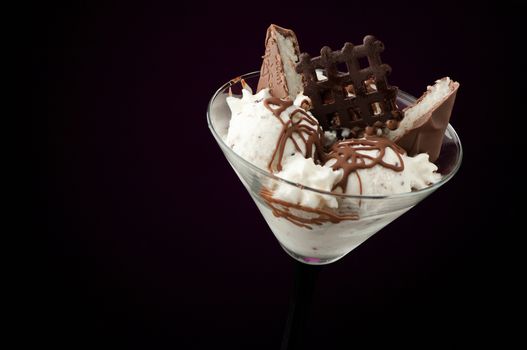 Ice cream in a vase on a dark background