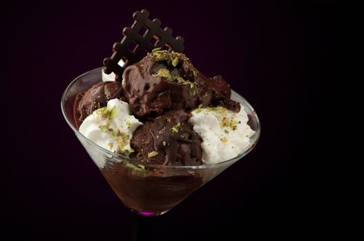 Ice cream in a vase on a dark background