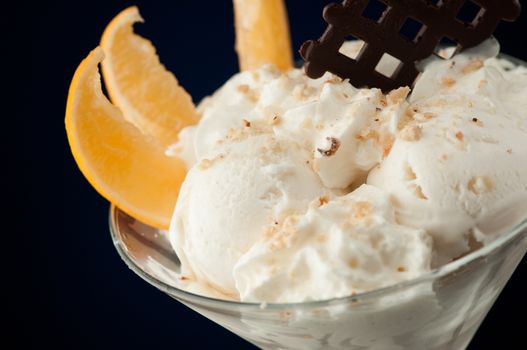 Ice cream in a vase on a dark background