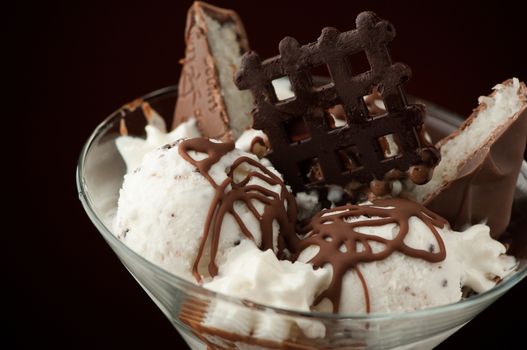 Ice cream in a vase on a dark background