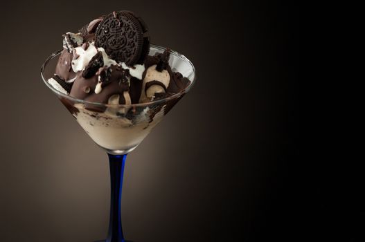 Ice cream in a vase on a dark background