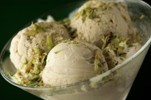 Ice cream in a vase on a dark background