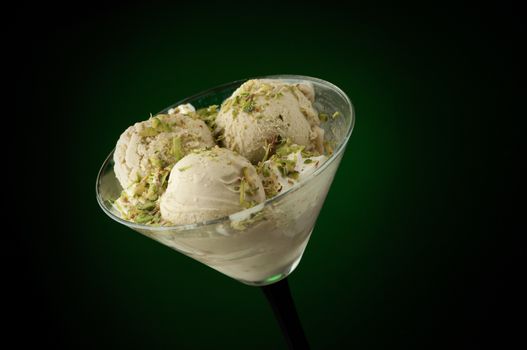 Ice cream in a vase on a dark background