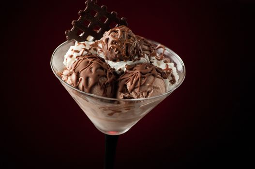 Ice cream in a vase on a dark background