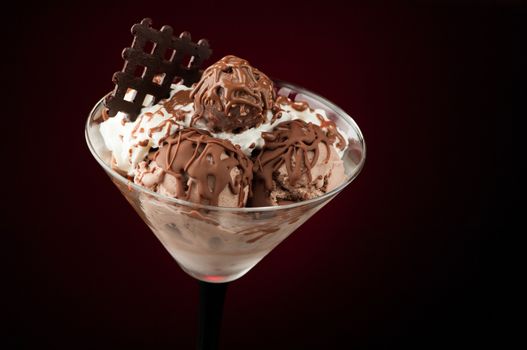 Ice cream in a vase on a dark background