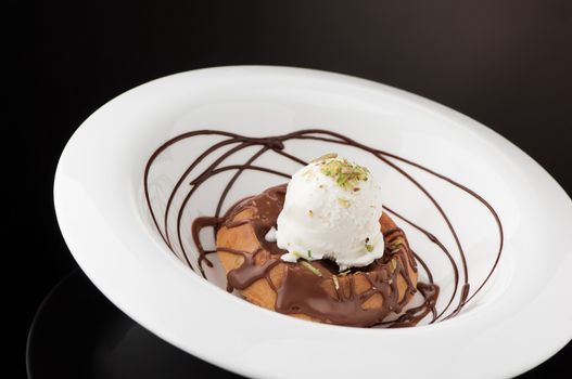 ice cream in a round white plate