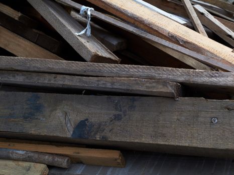  bunch of old different boards outdoors, firewood