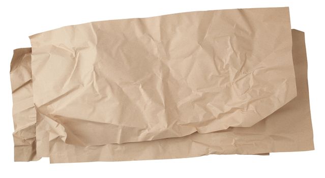 crumpled brown sheet of paper for packaging goods isolated on white background, close up