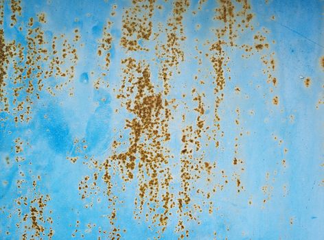 iron texture of rusty sheet with remains of blue paint. Metal rusty texture background rust steel.