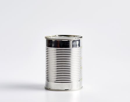 hard iron can for food preservation on a white background Closeup 